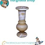 Handcrafted Egyptian alabaster vase, uniquely carved by skilled artisans from natural alabaster stone.