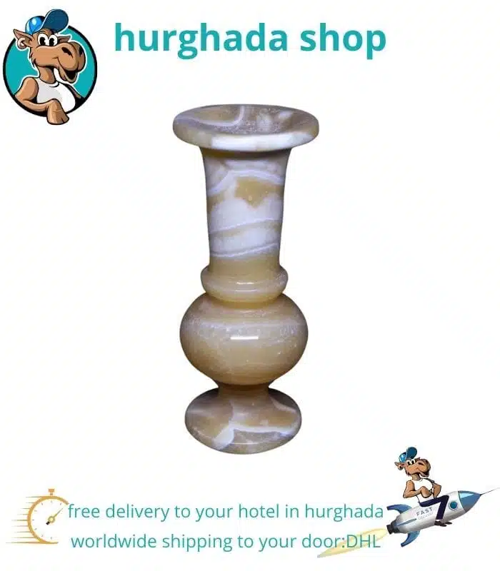 Handcrafted Egyptian alabaster vase, uniquely carved by skilled artisans from natural alabaster stone.