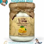 Mango Shea Butter Cream in a glass jar with kraft paper lid and mango fragrance label