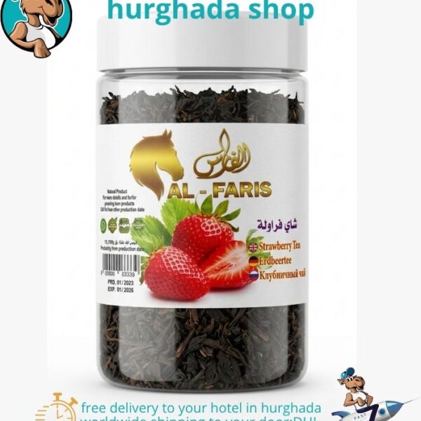 Berry Whisper Tea jar with loose-leaf black tea and fresh strawberries