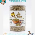 Harvest Fennel seeds in a clear jar with wooden bowl and scoop, natural digestive spice